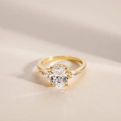 Sterling Silver Elegant Pear Accented Oval Brilliant Cut Ring