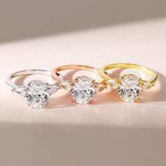 Sterling Silver Elegant Pear Accented Oval Brilliant Cut Ring