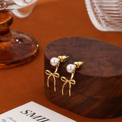 14K Pearl Accented Dangle Bow Earrings