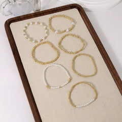 7-Piece Pearl & Gold Adjustable Bracelet Stack