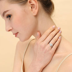 Sterling Silver Elegant Pear Accented Oval Brilliant Cut Ring