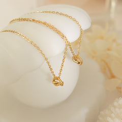 Gold-Tone Knotted Circle Pendant Necklace