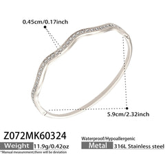 Wave and Cubic Zirconia Bangle Designs