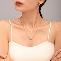 Cubic Zirconia Infinity Bow Necklace & Bracelet