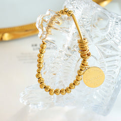 Gold-Tone Beaded Disc Charm Stretch Bracelet