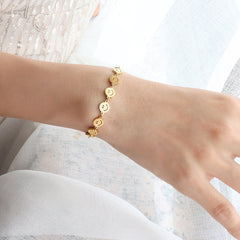 Gold-Tone Smiley Face Station Bracelet