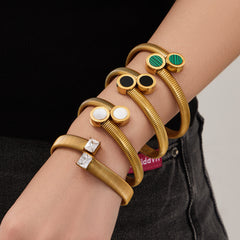Round Accent and Shell Bangle Designs