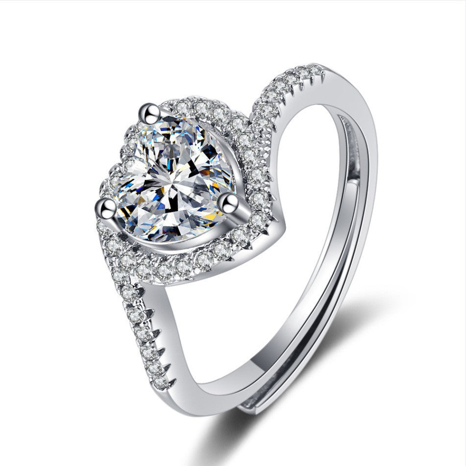 Lumière Charm Ring on a clean background