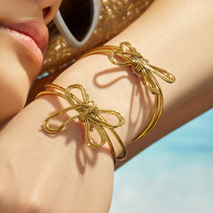 Gold-Tone Sculptural Bow Open Cuff