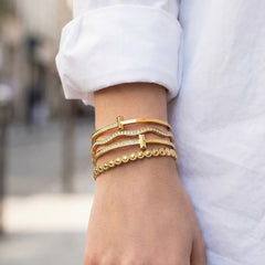 Wave and Cubic Zirconia Bangle Designs