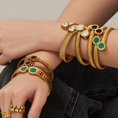 Round Accent and Shell Bangle Designs