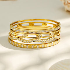 Gold-Tone Cubic Zirconia Wave Bangle Designs