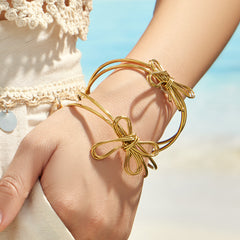 Gold-Tone Sculptural Bow Open Cuff