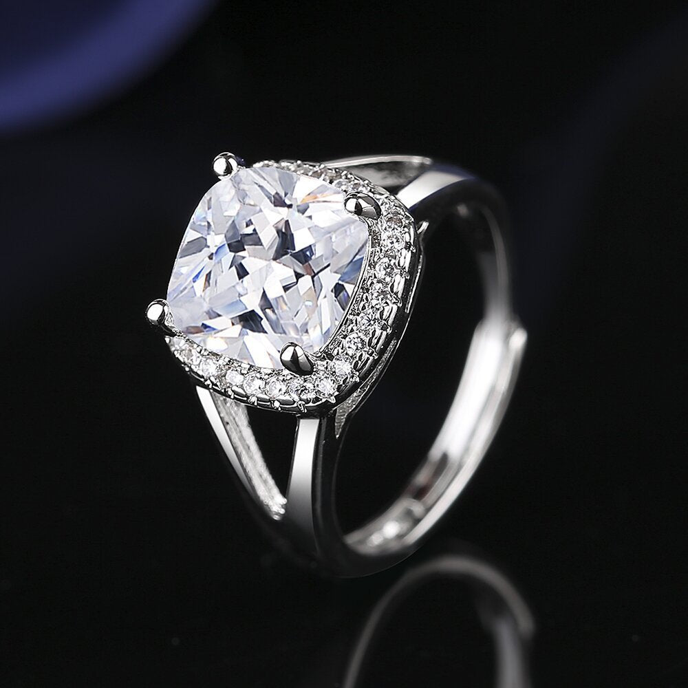 Lumière Charm Ring on a clean background