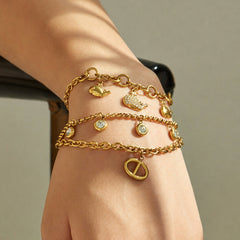 Dolphin Charm and Layered Cubic Zirconia Bracelets