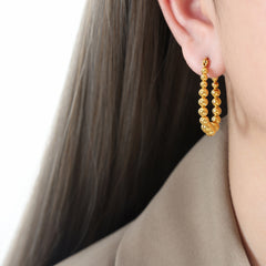 Graduated Bead Oval Hoop Earrings