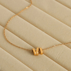 Twisted Sculptural Pendant Necklace
