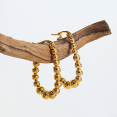 Graduated Bead Oval Hoop Earrings