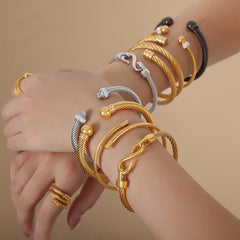 Sculptural Stainless Steel Bangle & Ring Designs