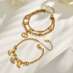 Dolphin Charm and Layered Cubic Zirconia Bracelets