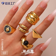 Gold-Tone Sculptural and Stone Ring Designs