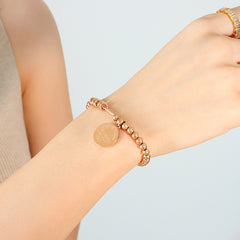 Gold-Tone Beaded Disc Charm Stretch Bracelet