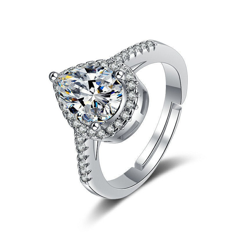 Lumière Charm Ring on a clean background