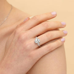 Sterling Silver Elegant Pear Accented Oval Brilliant Cut Ring