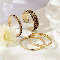 4-Piece Gold & Leopard Accented Bangle Stack