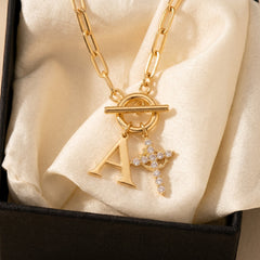 Paperclip Initial & Cross Toggle Clasp Necklace