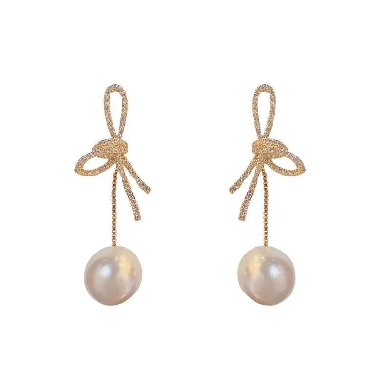 Dazzling Bowknot Pearl Drop Earrings - Veinci