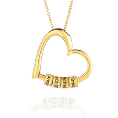 Heart necklace with engraved pearls