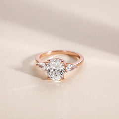 Sterling Silver Elegant Pear Accented Oval Brilliant Cut Ring