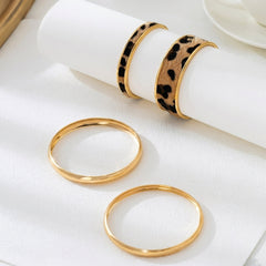 4-Piece Gold & Leopard Accented Bangle Stack