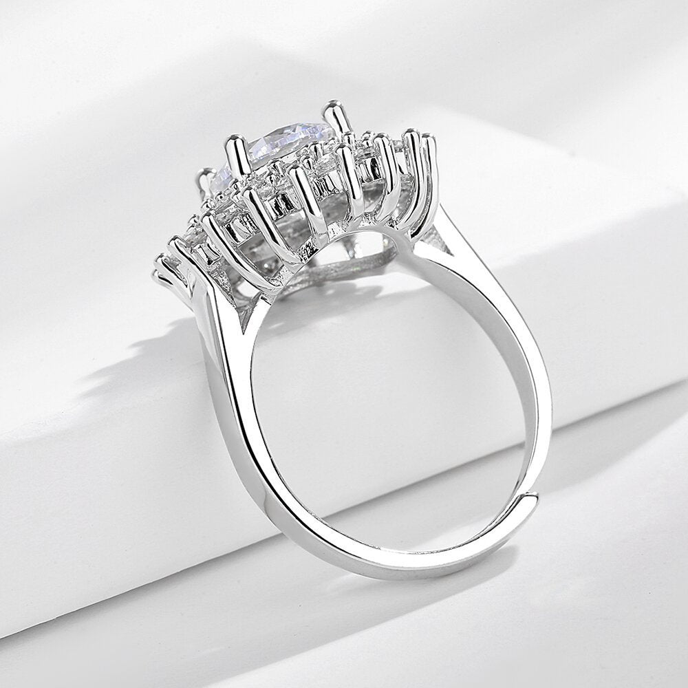 Lumière Charm Ring on a clean background