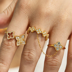 Mother-of-Pearl and Cubic Zirconia Floral Ring Designs