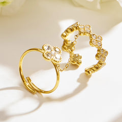 Mother-of-Pearl and Cubic Zirconia Floral Ring Designs