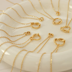 Gold-Tone Knotted Circle Pendant Necklace