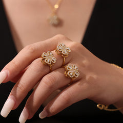 Rotating Cubic Zirconia Flower Necklace, Earrings or Ring