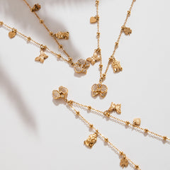 18K Gold-Plated Bow and Clover Charm Necklace