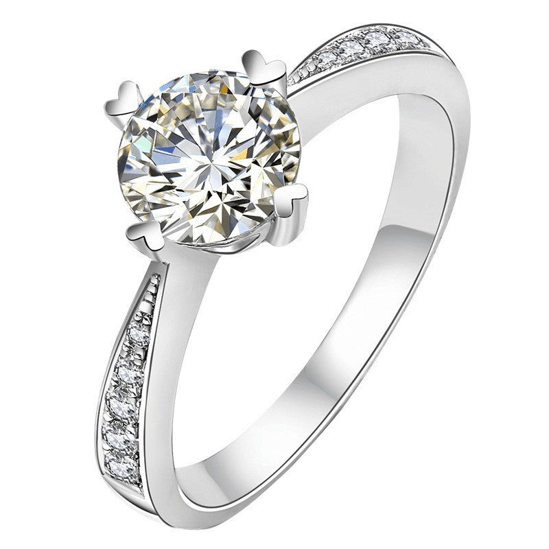 Lumière Charm Ring on a clean background