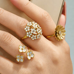 Daisy and Enamel Flower Ring Collection