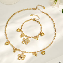 Cubic Zirconia Floral Charm Necklace and Bracelet