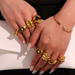 Gold-Tone Sculptural and Stone Ring Designs