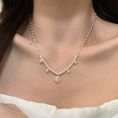 Nadine Vintage-Inspired Pearl Tassel Choker Necklace