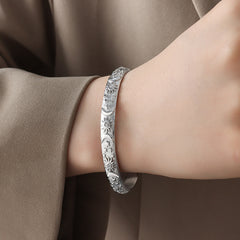 Embossed Floral Hoop Earrings & Open Cuff