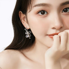 Daphne Textured Pavé Bow Stud Earrings