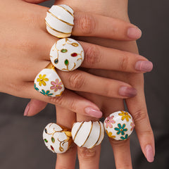 Gold-Tone Enamel and Mother-of-Pearl Ring Designs