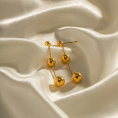 Dangle Gold Bead Tassel Earrings