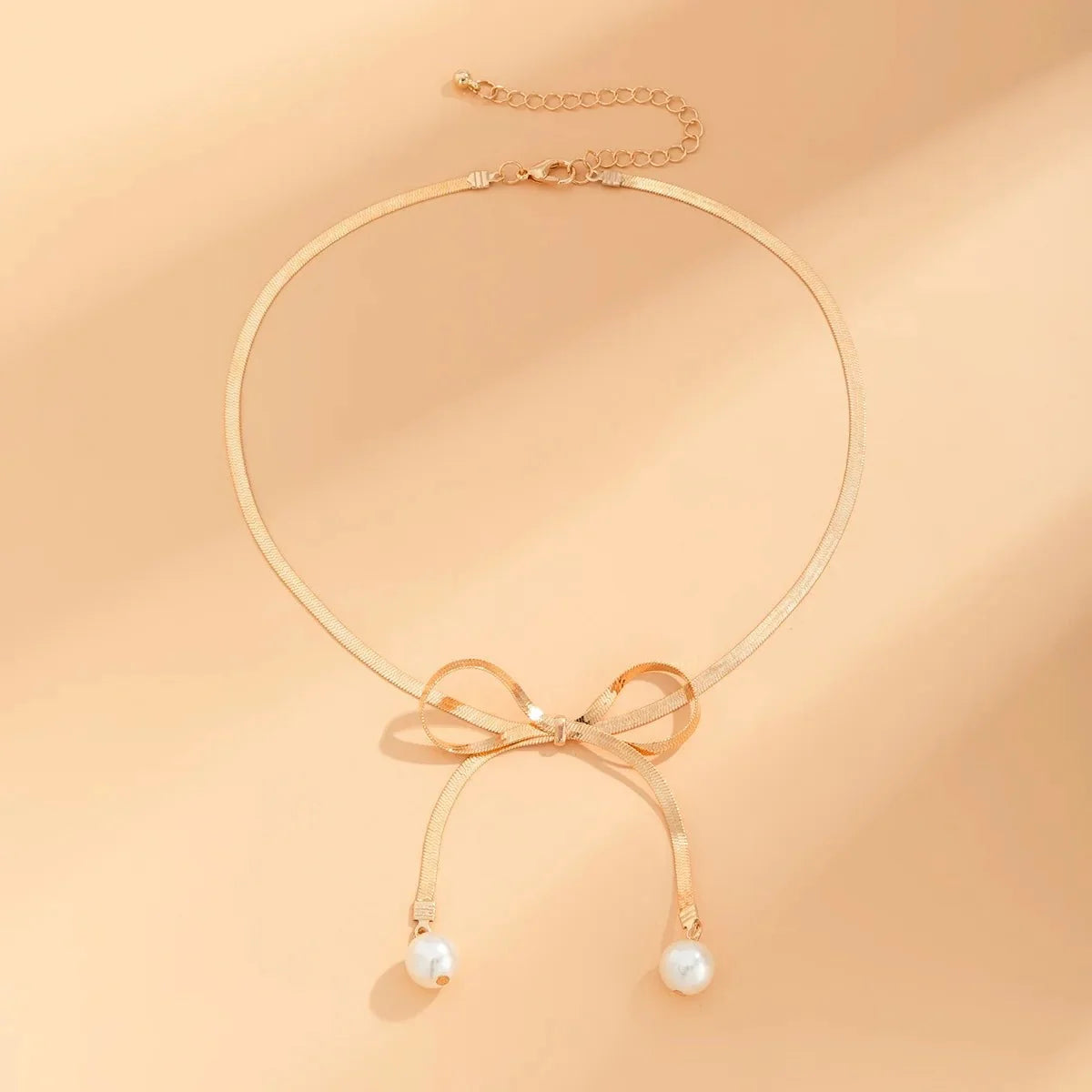 Dainty Herringbone Pearl Bow Necklace - Veinci